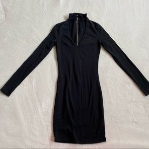 Black bodycon dress with neck cutout